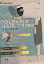 This image shows a Brookstone foldable hair dryer.